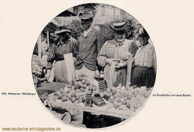 Ein schwarzer Mitbürger als Verkäufer auf dem Markt. (Berlin 1905)